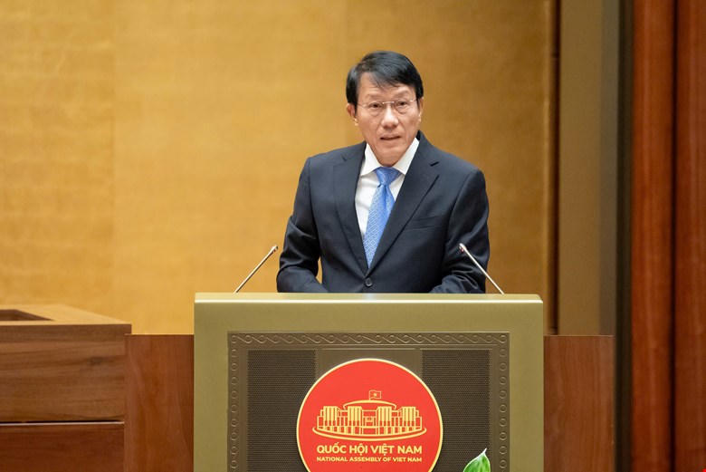 Bộ trưởng Bộ Công an Lương Tam Quang trình bày tờ trình. Ảnh: Quang Vinh.