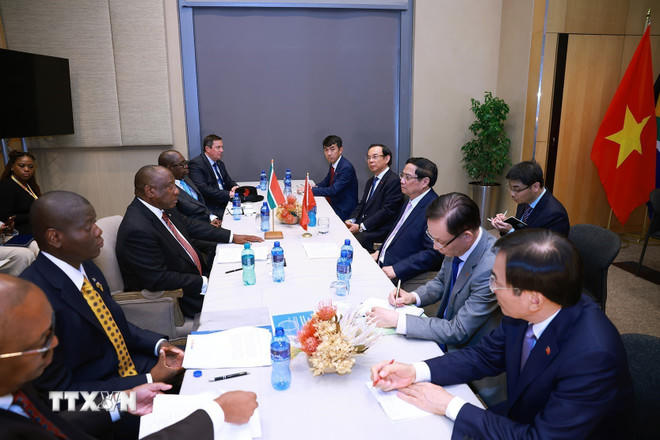 Thủ tướng Phạm Minh Chính hội kiến Tổng thống Cộng hòa Nam Phi Matamela Cyril Ramaphosa. (Ảnh: Dương Giang/TTXVN)