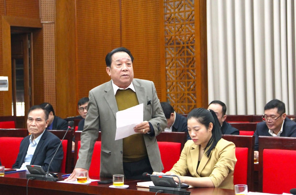 Đại biểu đóng góp ý kiến tại hội nghị phản biện.&nbsp;