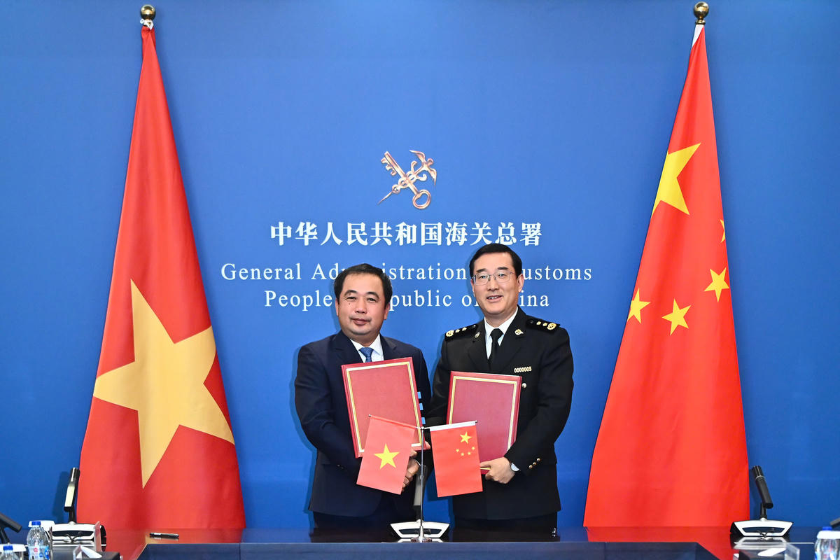 Ký kết Nghị định thư xuất khẩu mít tươi của Việt Nam sang Trung Quốc. Ảnh: NN