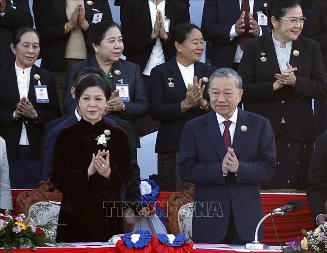 Tổng Bí thư Tô Lâm và Phu nhân dự Lễ kỷ niệm 50 năm Quốc khánh Lào và 105 năm Ngày sinh Chủ tịch Kaysone Phomvihane. Ảnh: Thống Nhất/TTXVN