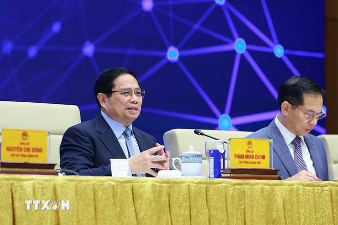 Thủ tướng Phạm Minh Chính chủ trì Diễn đàn Quốc gia phát triển kinh tế số và xã hội số lần thứ 3. (Ảnh: Dương Giang/TTXVN).