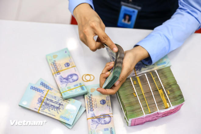 Các nguồn lực tài chính-ngân sách nhà nước được quản lý, huy động và sử dụng ngày càng hiệu quả. (Ảnh: Vietnam+).