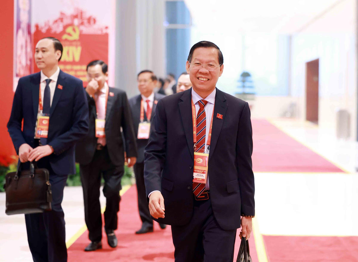 Các đại biểu đến tham dự Đại hội XIV của Đảng. Ảnh: VT-VM