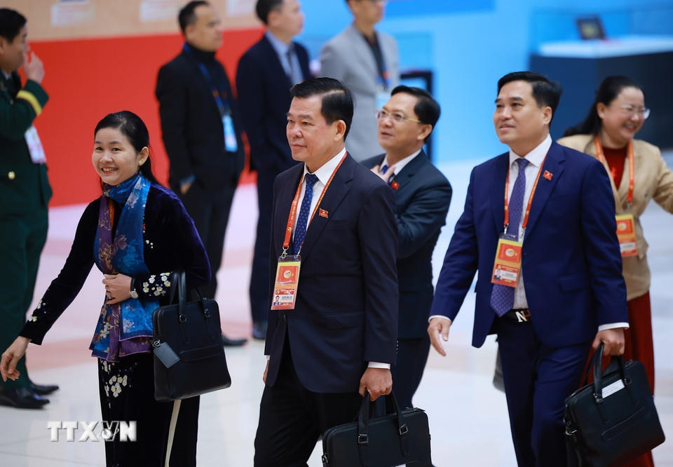 Các đại biểu đến dự ngày làm việc thứ tư Đại hội XIV của Đảng, sáng 22/1. (Ảnh: TTXVN).&nbsp;