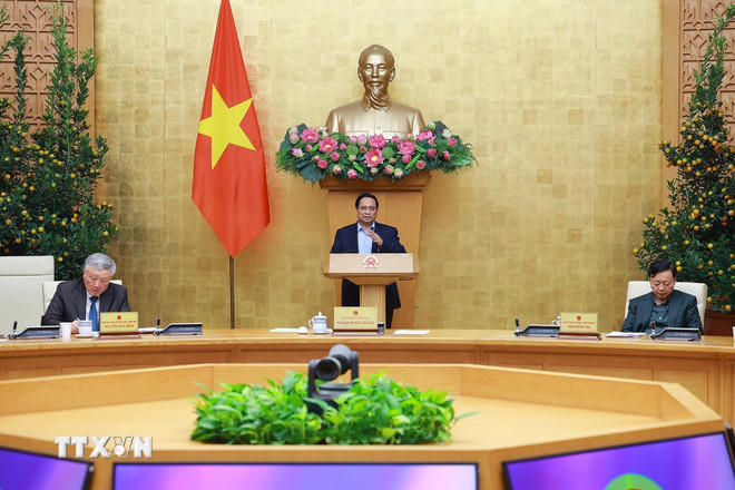 Thủ tướng Phạm Minh Chính chủ trì họp đánh giá tình hình Tết Nguyên đán Bính Ngọ. (Ảnh: Dương Giang/TTXVN).