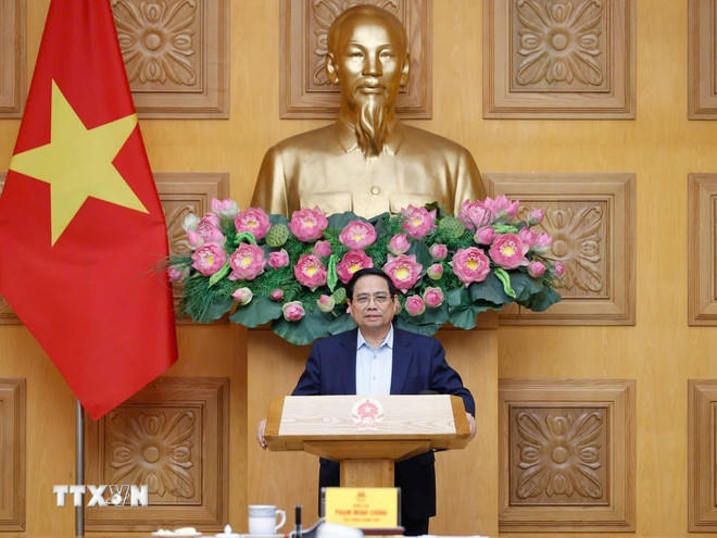 Thủ tướng Phạm Minh Chính họp với Hội đồng Tư vấn chính sách để nghe các ý kiến góp ý về ứng phó với các thách thức hiện nay trong khu vực và trên thế giới. (Ảnh: Dương Giang/TTXVN).