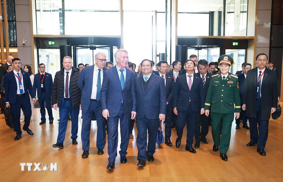 Thủ tướng Phạm Minh Chính đến thăm và làm việc với lãnh đạo Tập đoàn Novatek. (Ảnh: Dương Giang/TTXVN)