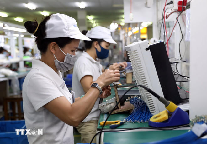 Dây chuyền sản xuất, lắp ráp linh kiện cho bếp gas tại khu công nghiệp, đô thị VSIP Hải Phòng. (Ảnh: Danh Lam/TTXVN).