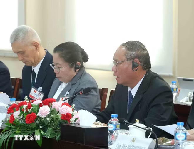 ttxvn-thuong-truc-ban-bi-thu-tran-cam-tu-hoi-dam-voi-thuong-truc-ban-bi-thu-tu-dang-ndcm-lao-0904-13.jpg