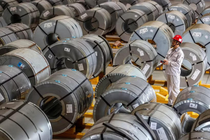 Nhôm được sản xuất tại nhà máy ở Vũ Hán, tỉnh Hồ Bắc, Trung Quốc. Ảnh: AFP/ TTXVN.