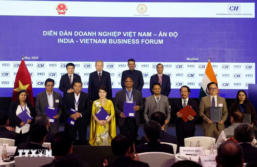 ttxvn-tong-bi-thu-chu-tich-nuoc-to-lam-phat-bieu-khai-mac-tai-dien-dan-hop-tac-thuong-mai-dau-tu-du-lich-viet-nam-an-do-0705-4.jpg