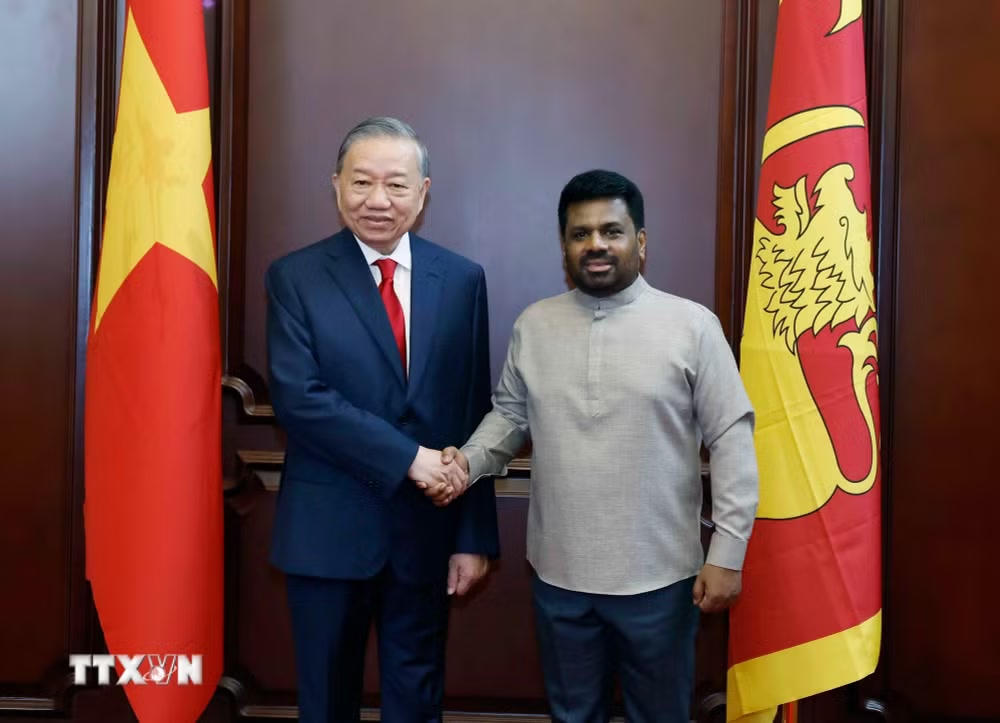 ttxvn-le-don-tong-bi-thu-chu-tich-nuoc-to-lam-tham-cap-nha-nuoc-sri-lanka-2.jpg
