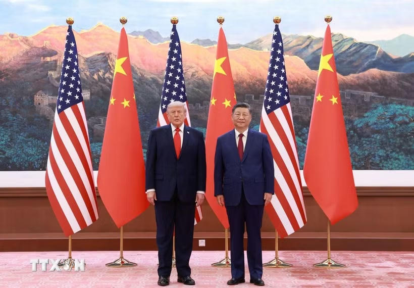 Chủ tịch Trung Quốc Tập Cận Bình (phải) trong cuộc hội đàm với Tổng thống Mỹ Donald Trump (trái, phía trước) đang ở thăm Bắc Kinh, ngày 14/5/2026. (Ảnh: THX/TTXVN).