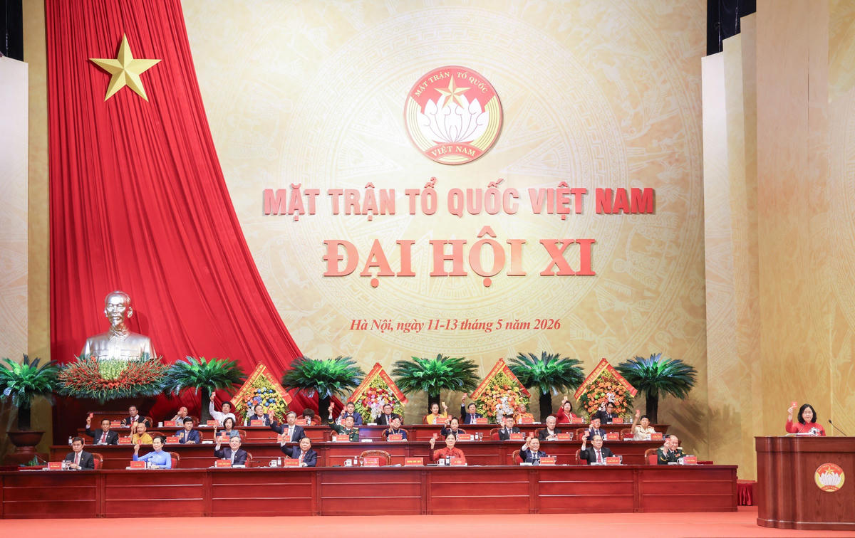 Đại hội biểu quyết thông qua Nghị quyết Đại hội đại biểu toàn quốc Mặt trận Tổ quốc Việt Nam lần thứ XI, nhiệm kỳ 2026 - 2031. Ảnh: Quang Vinh.