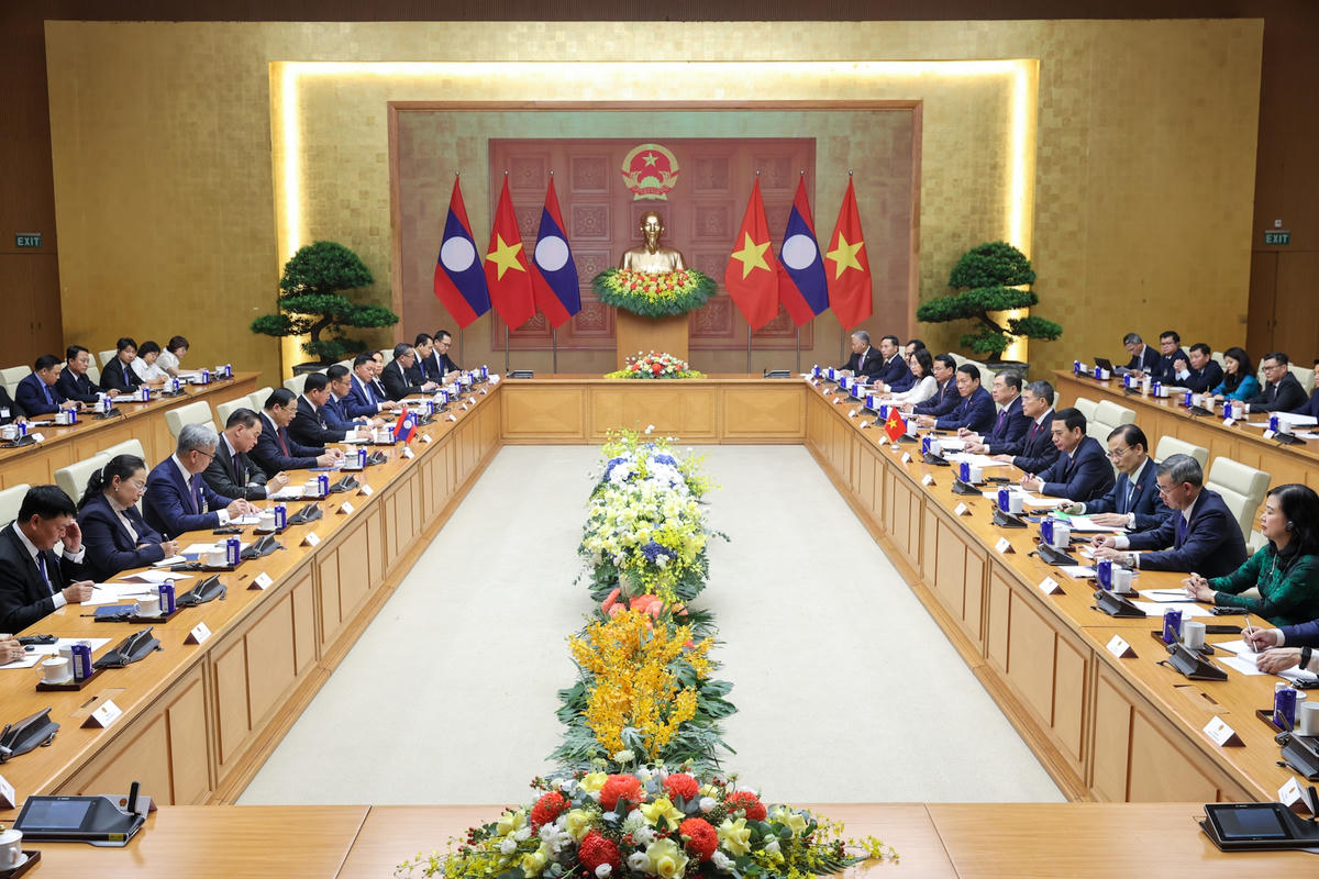 Thủ tướng Chính phủ Lê Minh Hưng và Thủ tướng Sonexay Siphandone tiến hành hội đàm - Ảnh: Nhật Bắc