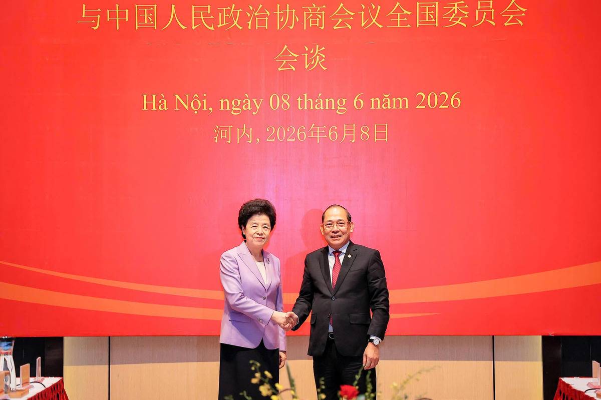 Phó Chủ tịch UBTƯ MTTQ Việt Nam Hoàng Công Thủy và Phó Chủ tịch Chính hiệp toàn quốc Trung Quốc Hàm Huy.