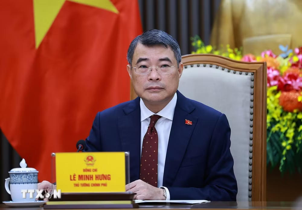 Thủ tướng Chính phủ Lê Minh Hưng điện đàm với Thủ tướng Trung Quốc Lý Cường. (Ảnh: Dương Giang/TTXVN).