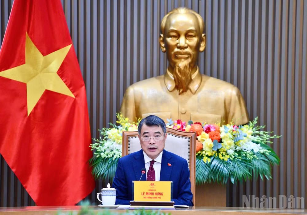 Thủ tướng Chính phủ Lê Minh Hưng điện đàm với Thủ tướng Trung Quốc Lý Cường. (Ảnh: Thanh Giang)
