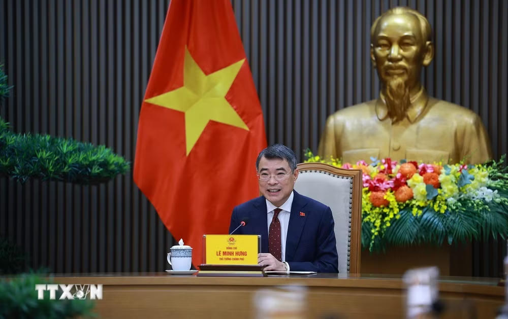 Thủ tướng Chính phủ Lê Minh Hưng điện đàm với Thủ tướng Trung Quốc Lý Cường. (Ảnh: Dương Giang/TTXVN).
