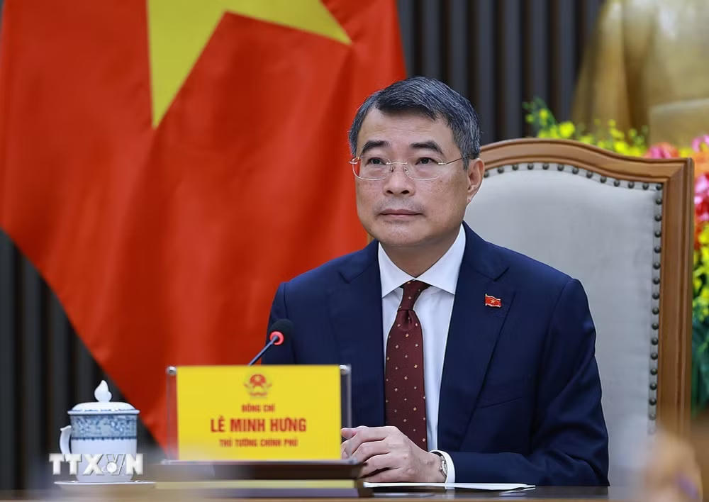 Thủ tướng Chính phủ Lê Minh Hưng điện đàm với Thủ tướng Trung Quốc Lý Cường. (Ảnh: Dương Giang/TTXVN).