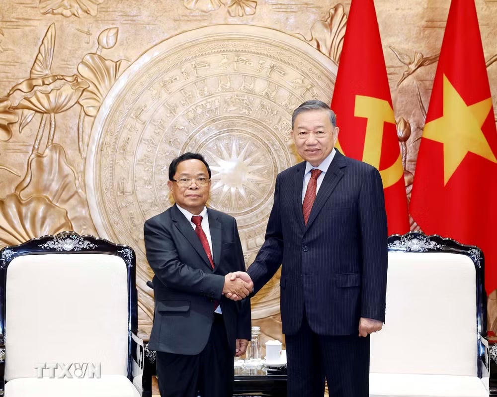 ttxvn-tong-bi-thu-chu-tich-nuoc-tiep-pho-thu-tuong-bo-truong-tu-phap-lao-16-1.jpg