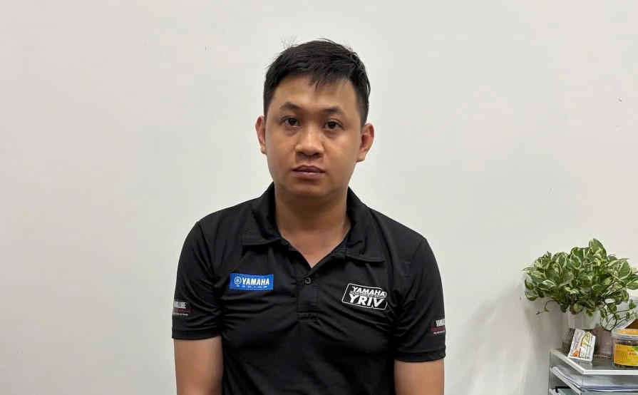 Đối tượng Lê Việt Cường tại cơ quan điều tra. Ảnh: CA Đà Nẵng.