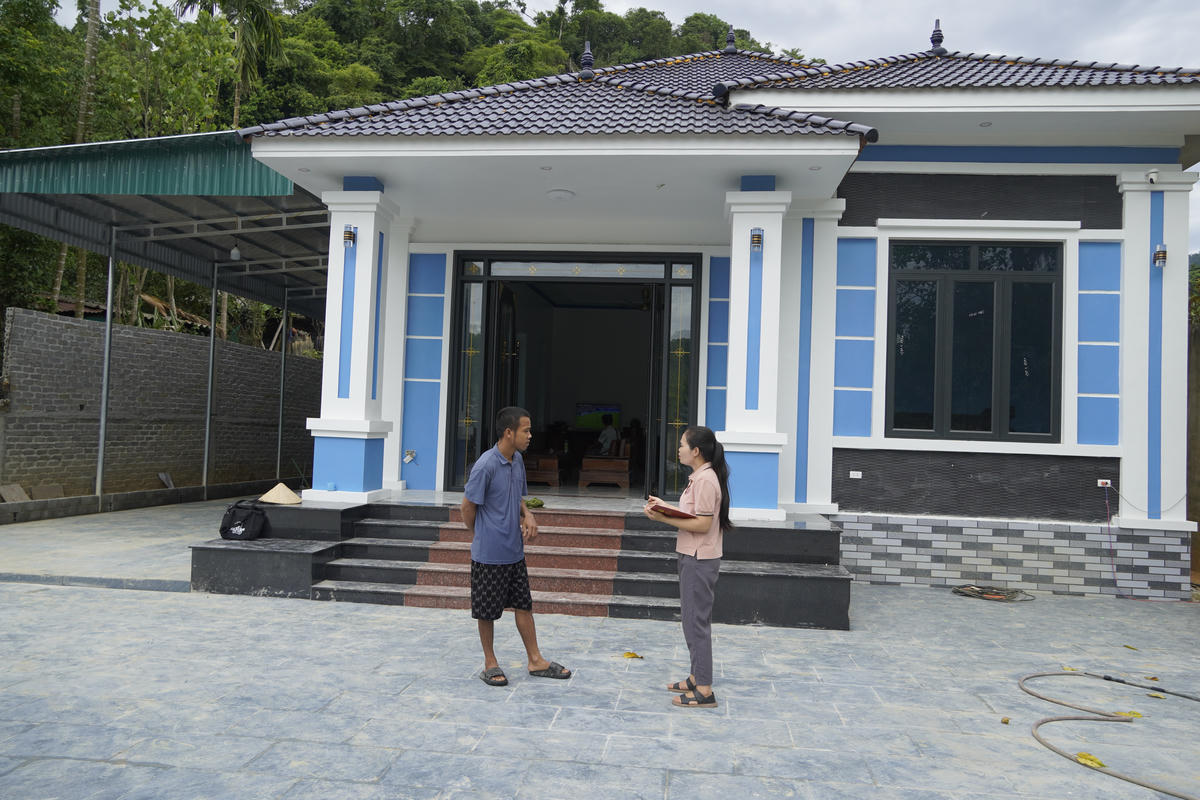 Ngôi nhà khang trang của anh Lang Văn Yên ở xã Thanh Phong có được nhờ việc đi XKLĐ tại Đài Loan. Ảnh: Thanh Phon