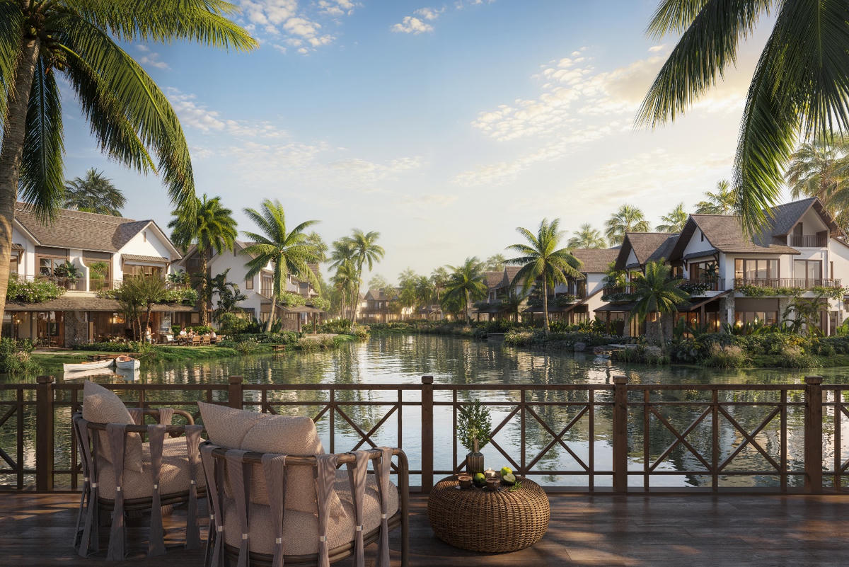 A deck with chairs and a body of water with houses and trees

Description automatically generated