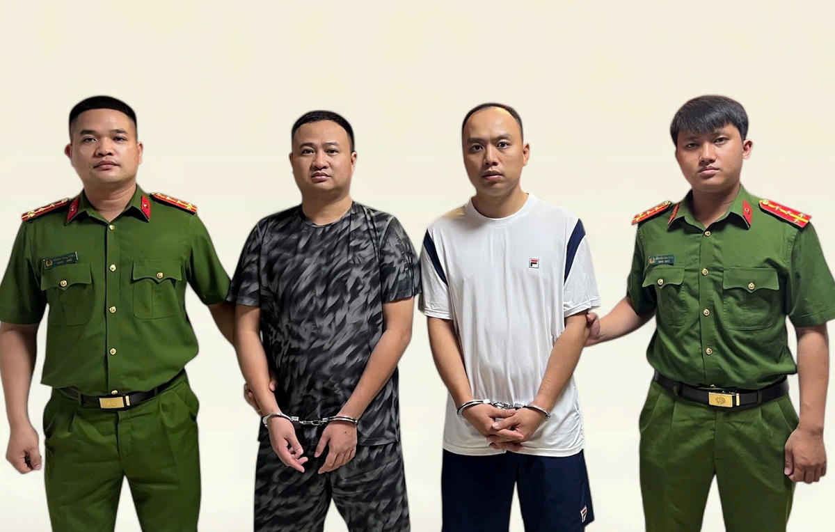 Đối tượng Nguyễn Văn Nam và Phạm Quang Hoàn (từ trái sang phải). Ảnh: CATP.