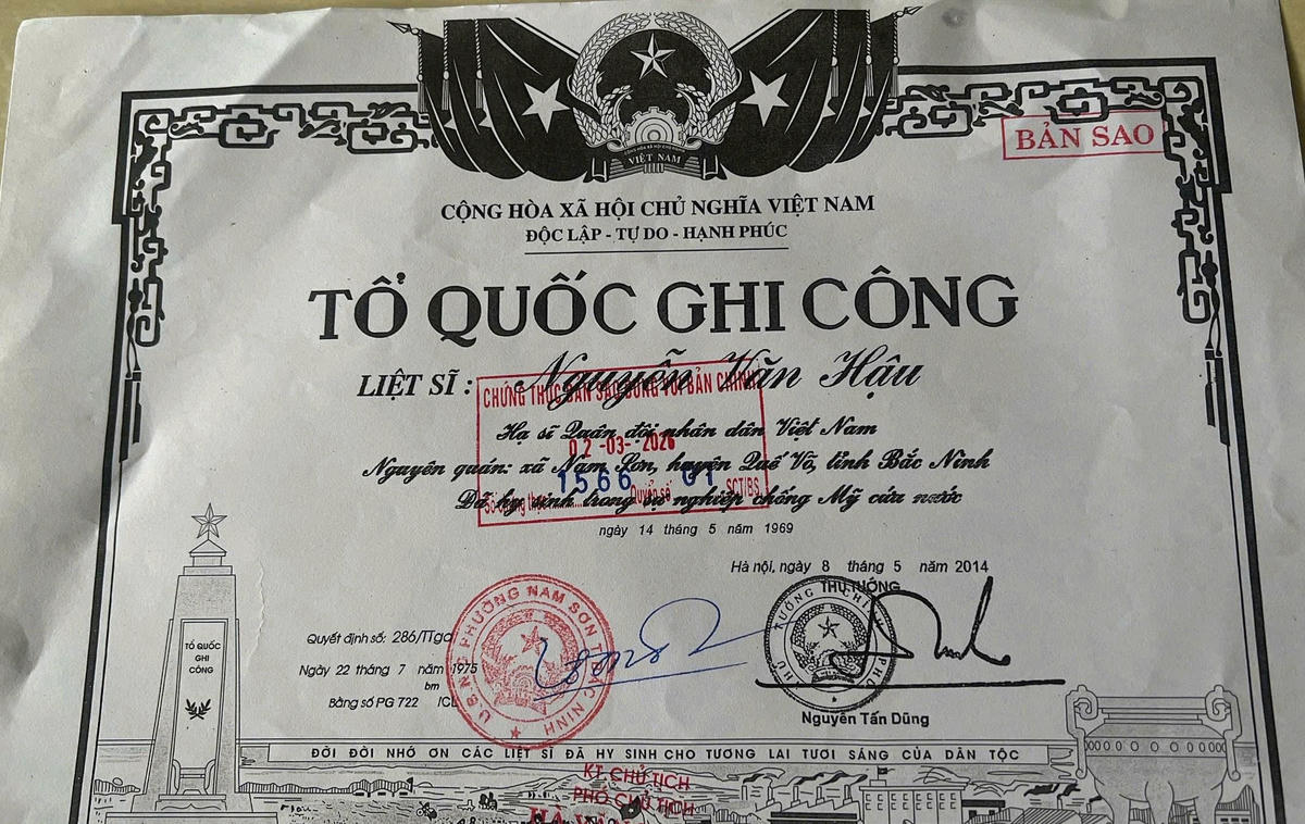 Bản sao giấy chứng nhận Bằng Tổ quốc ghi công của Liệt sĩ Nguyễn Văn Hậu. Ảnh: QS.