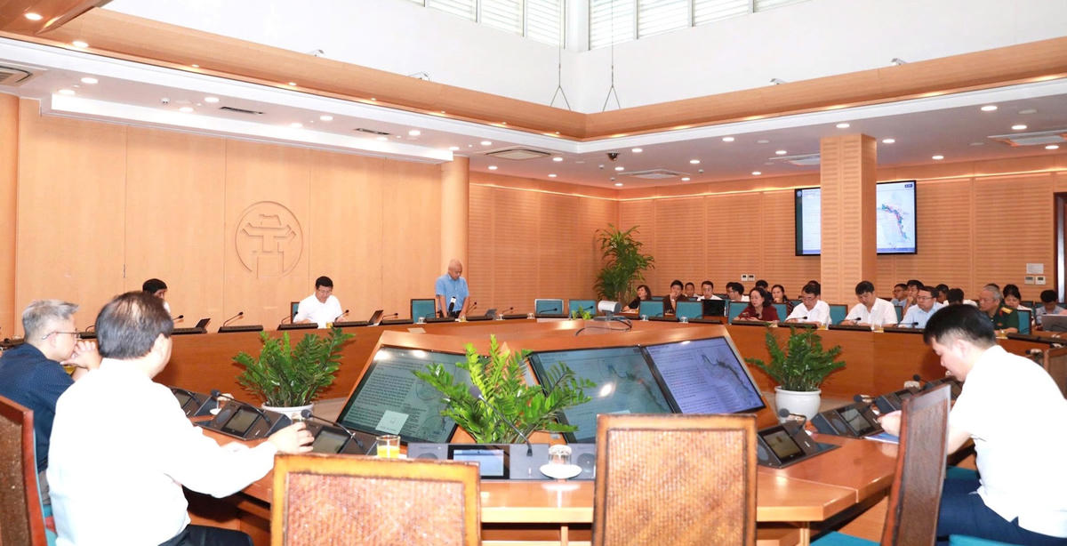 Quang cảnh hội nghị tại điểm cầu trụ sở UBND TP Hà Nội.