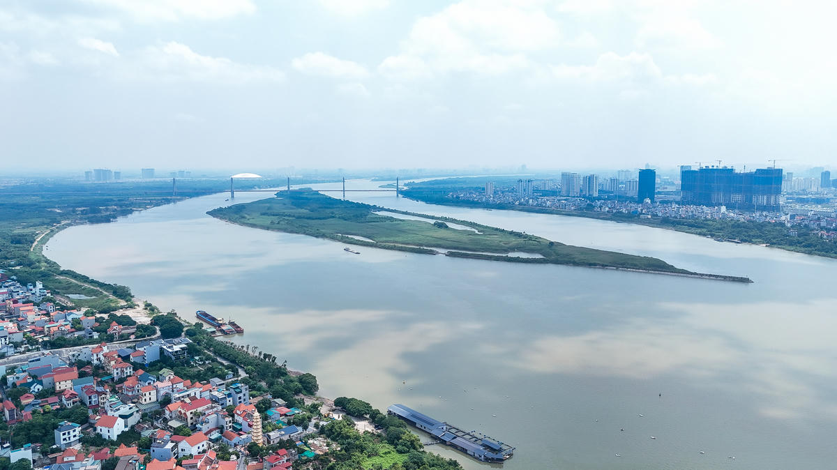 Sông Hồng vừa là dòng sông, vừa là không gian sinh tồn, giao thương và kết nối các cộng đồng. Ảnh: Quang Vinh