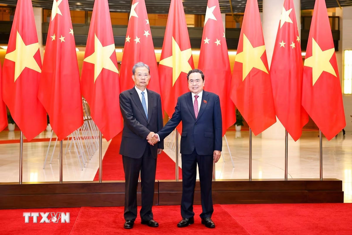 ttxvn_chu-tich-quoc-hoi-tran-thanh-man-don-hoi-dam-voi-uy-vien-truong-nhan-dai-toan-quoc-trung-quoc-trieu-lac-te-8247072.jpg