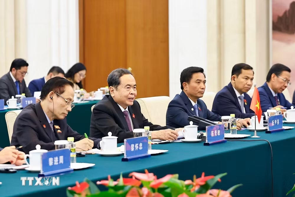 ttxvn_chu-tich-quoc-hoi-tran-thanh-man-hoi-kien-chu-tich-chinh-hiep-toan-quoc-trung-quoc-vuong-ho-ninh-7601.jpg