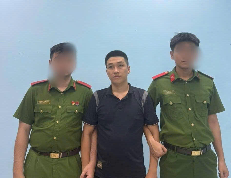 Đối tượng Nguyễn Tấn Biên tại cơ quan điều tra. Ảnh: CA Đà Nẵng.