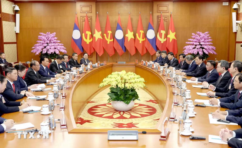 ttxvn_thuong-truc-ban-bi-thu-tran-cam-tu-hoi-dam-voi-thuong-truc-ban-bi-thu-lao-7.jpg