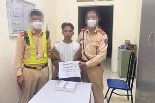 Sơn La: Bắt thanh niên người Lào đem bán 4 bánh heroin