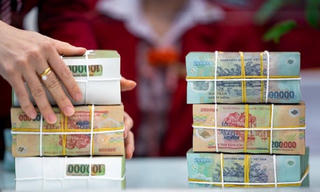 Gia tăng áp lực nợ xấu lên hệ thống ngân hàng