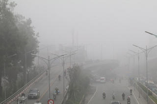 Ngày 3/2, mưa phùn và sương mù bao trùm Hà Nội