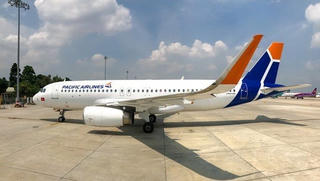 Vì sao giá vé máy bay tăng cao?