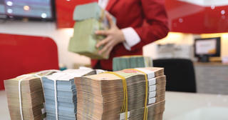 Ngân hàng chưa nguôi nỗi lo nợ xấu