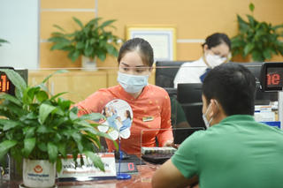 Đẩy mạnh cho vay, nhưng không hạ chuẩn