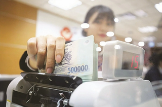 Lợi nhuận 'khủng', nhiều ngân hàng vẫn 'đau đầu' với nợ xấu 