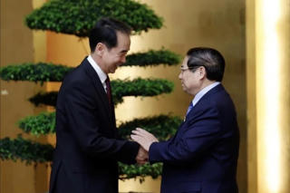 Thủ tướng Phạm Minh Chính tiếp Đại sứ Trung Quốc tại Việt Nam Hà Vĩ