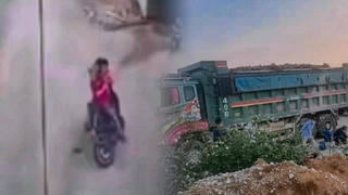 2 học sinh nằm gọn dưới gầm xe Howo