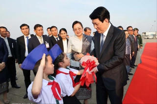 Chủ tịch nước về tới Hà Nội, kết thúc tốt đẹp chuyến thăm cấp Nhà nước tới Lào