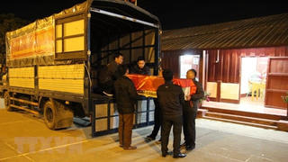 Lễ tiễn đưa hài cốt liệt sĩ quân tình nguyện và chuyên gia Việt Nam hy sinh tại Lào về Đất Mẹ