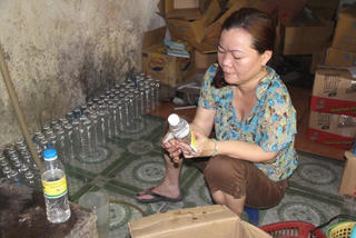 Axít và nước lã thành giấm đóng chai