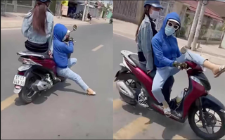 [VIDEO]: Nữ ‘ninja’ chở bạn trên xe máy ‘làm xiếc’ trên đường